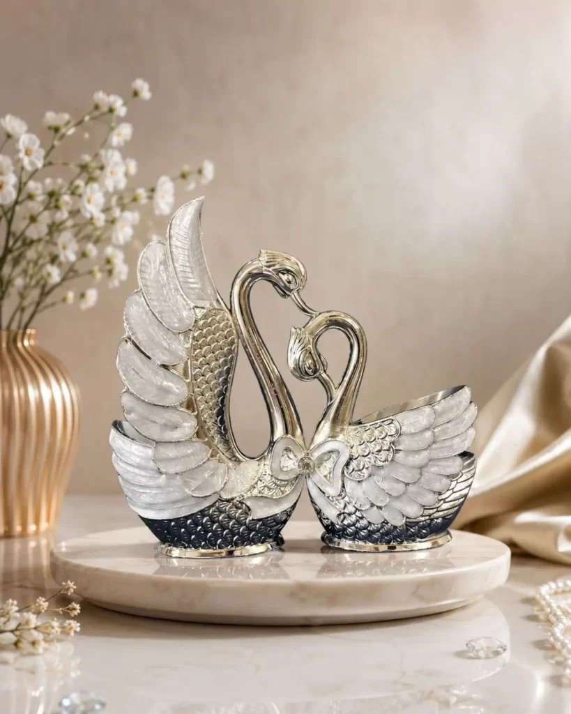 White enamel swan forks and knives set with Holder